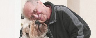 elderly man with his dog