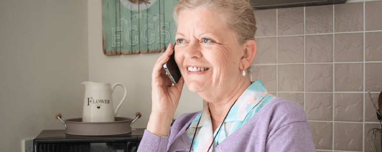 older woman using modern technology